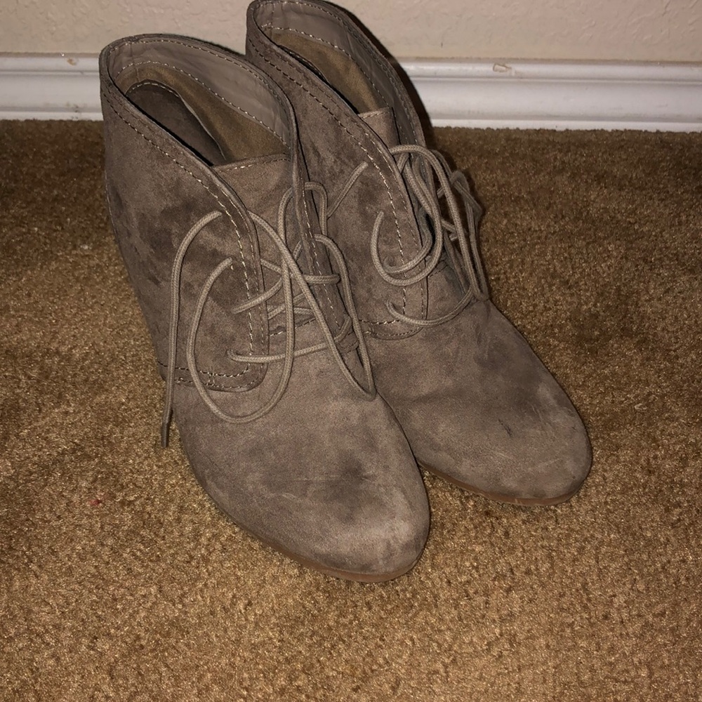 Lace up suede booties with a heel